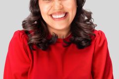 Laura Del Angel Headshots 2024 with grey background - LauraDelAngel_Headshot_med_24